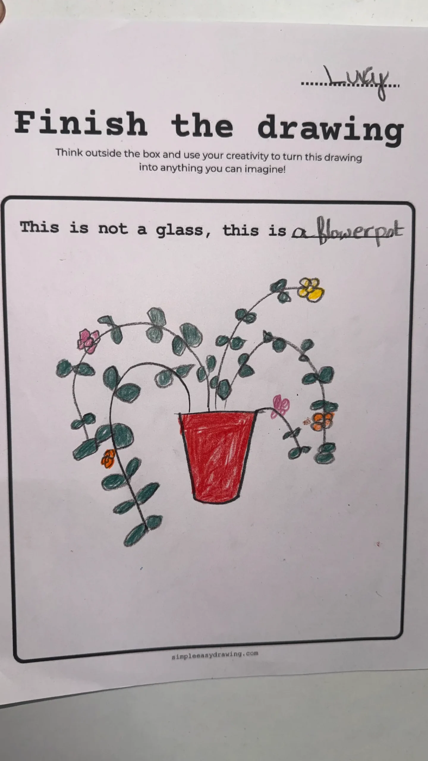 Finish the Drawing Worksheet with a glass turned into a flower pot with flowers.