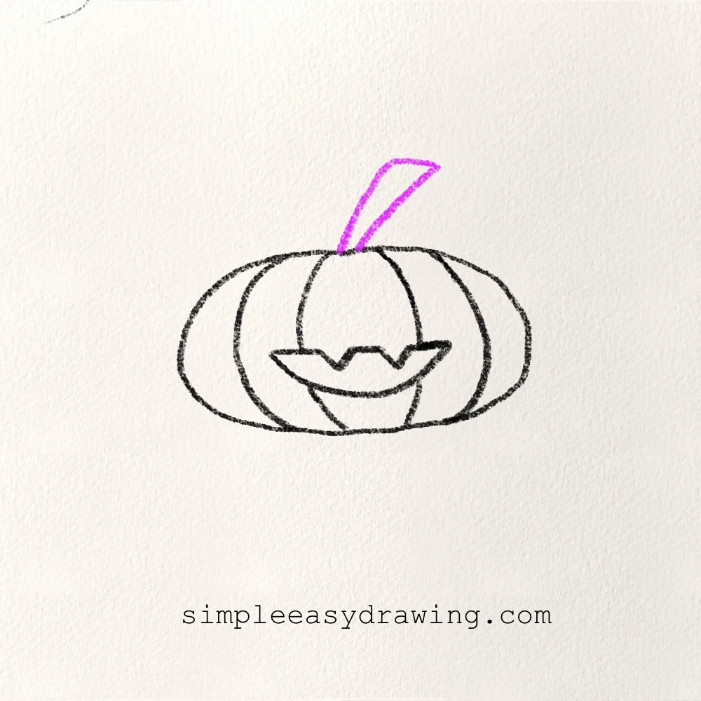 Adding a short stem to the top of the pumpkin.